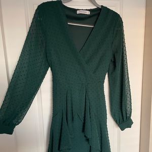 Emerald green light and flowy dress.